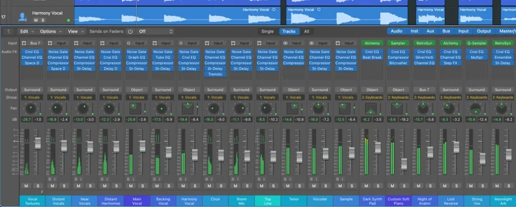 Logic Pro mixer on a MacBook with vocal and keyboard channel strips, plugins and faders