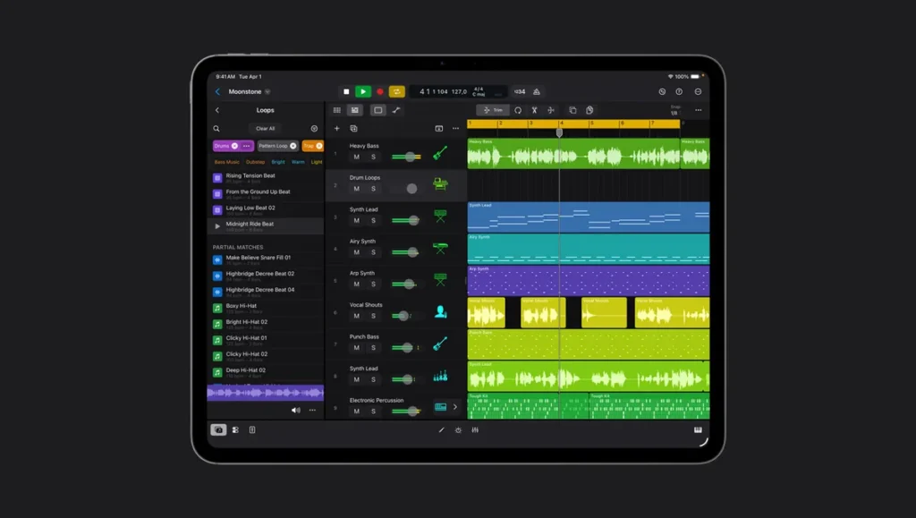 Logic Pro for iPad showing a song's tracks and the Loops browser on an iPad Pro