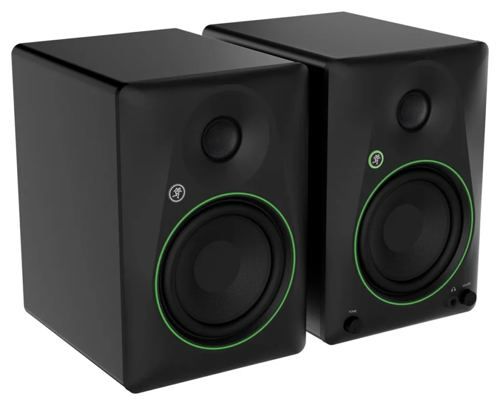 Mackie CR5BT studio monitor pair in black with green woofer rings, tone and volume knobs on the front
