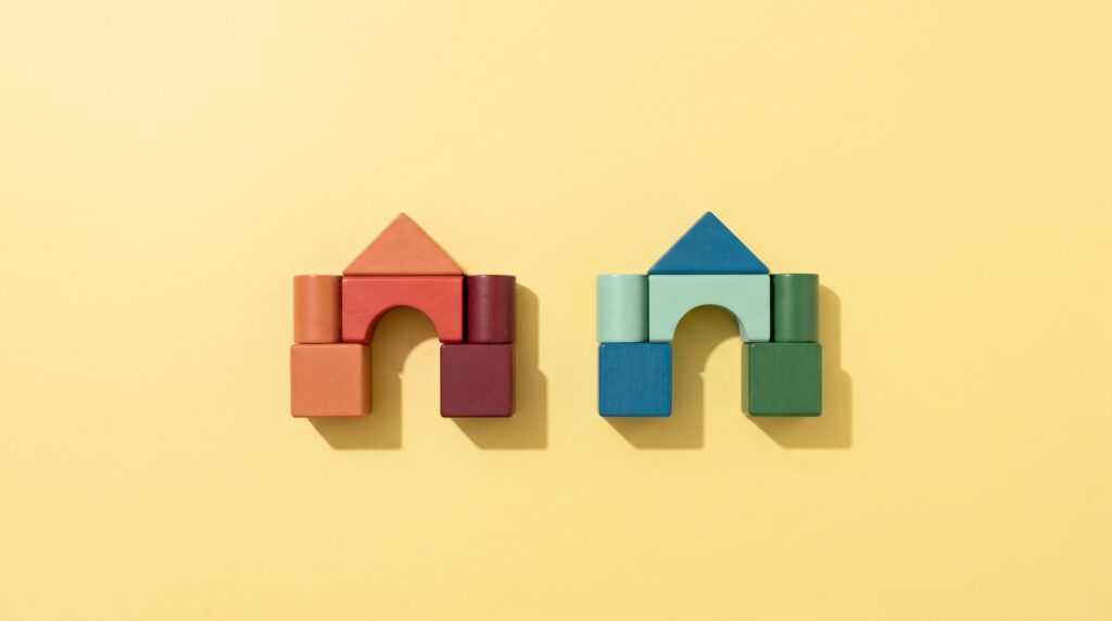 Two toy houses built from the same wooden blocks in different colors, like FL Studio and Ableton: the same parts that just look different