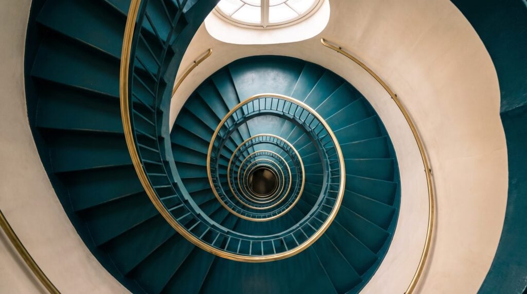 Looking down a spiral staircase that winds round and round, like an 8-bar loop that never turns into a song