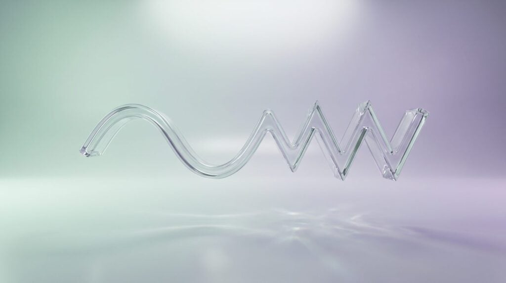A clear glass wave that starts as a smooth sine curve and sharpens into a jagged saw shape, floating over a mint and lilac gradient