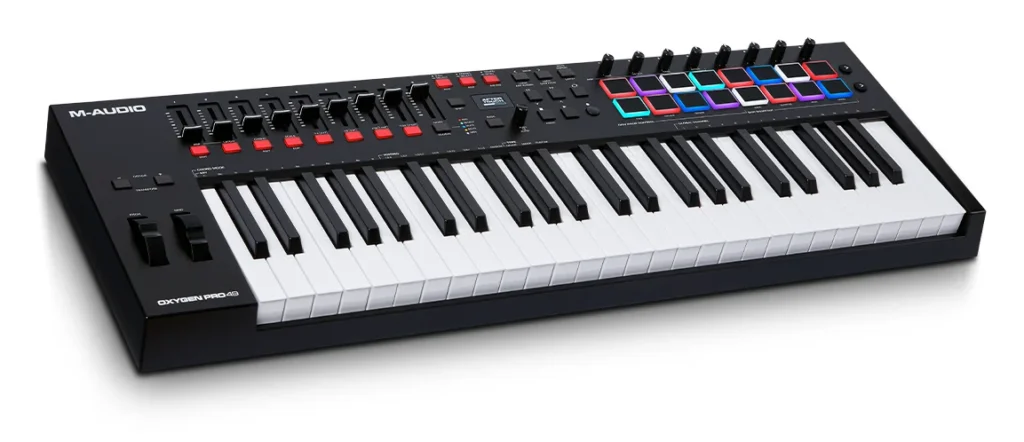 M-Audio Oxygen Pro 49 MIDI keyboard with 49 keys, 16 colored pads, knobs and faders, seen at an angle